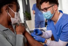 Law mandating vaccinations for non-Caymanians in effect