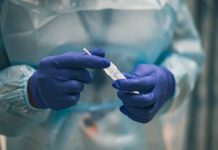 As COVID cases surge in China, Cayman assesses risk