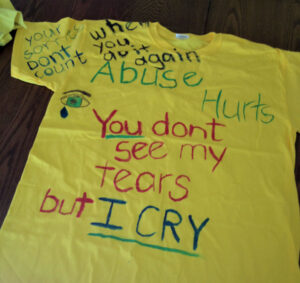 T-shirts designed by persons affected by domestic violence and their supporters went on display at the Women’s Health Clinic at the Cayman Islands Hospital and at the Central Post Office in George Town, as part of the annual Clothesline Project.