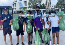 Plastic Free Cayman Hosts Community Clean Up on Opening Day Microplastics Removed from Beach South Sound - Plastic Free Cayman
