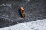 Body washes ashore after drug boat runs aground on East End reef