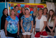 Visual Arts Society prepares for market at Camana Bay