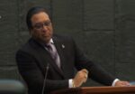 McLaughlin urges gov’t to address work permit delays