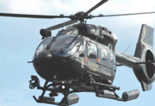 Cayman police helicopter aids Turks and Caicos in migrant crisis