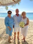 ‘Twosday’ wedding on Seven Mile Beach after 2-year wait