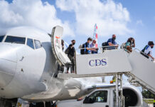 Cayman drops post-arrival COVID testing for vaccinated travellers