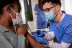 Mandatory vaccinations for contracted gov’t workers moves forward