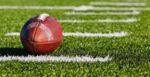 Flag football: Deloitte defeats Anytime Fitness in round 4 of coed league