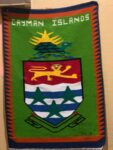 Handmade Cayman coat of arms tapestry stolen from restaurant