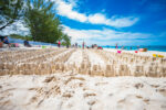 Volunteers gather in attempt to make world’s longest line of sandcastles