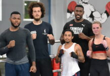 Nigel Paul climbs in the ring with local boxers