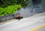 Motorbike on fire at roadside near Spotts Beach