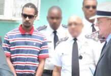Privy Council judges to hear exiled prisoners case in Cayman Justin Ramoon at a site-visit at the Globe Bar in George Town during his trial for murder (officers' faces have been deliberately blurred).