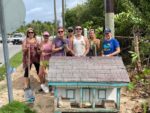 Volunteers restoring West Bay’s miniature Cayman cottages Volunteers-Brac-houses