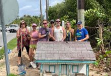 Volunteers restoring West Bay’s miniature Cayman cottages Volunteers-Brac-houses