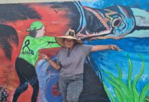 Painting through the pain: Grieving mum beautifies Cayman Brac