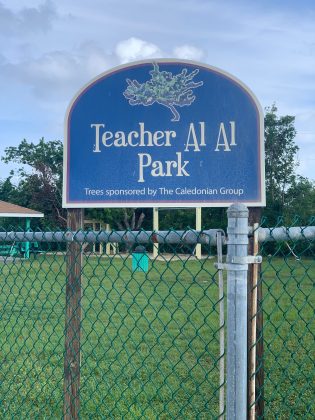 Teacher Al Al Park has a slide and swingset.