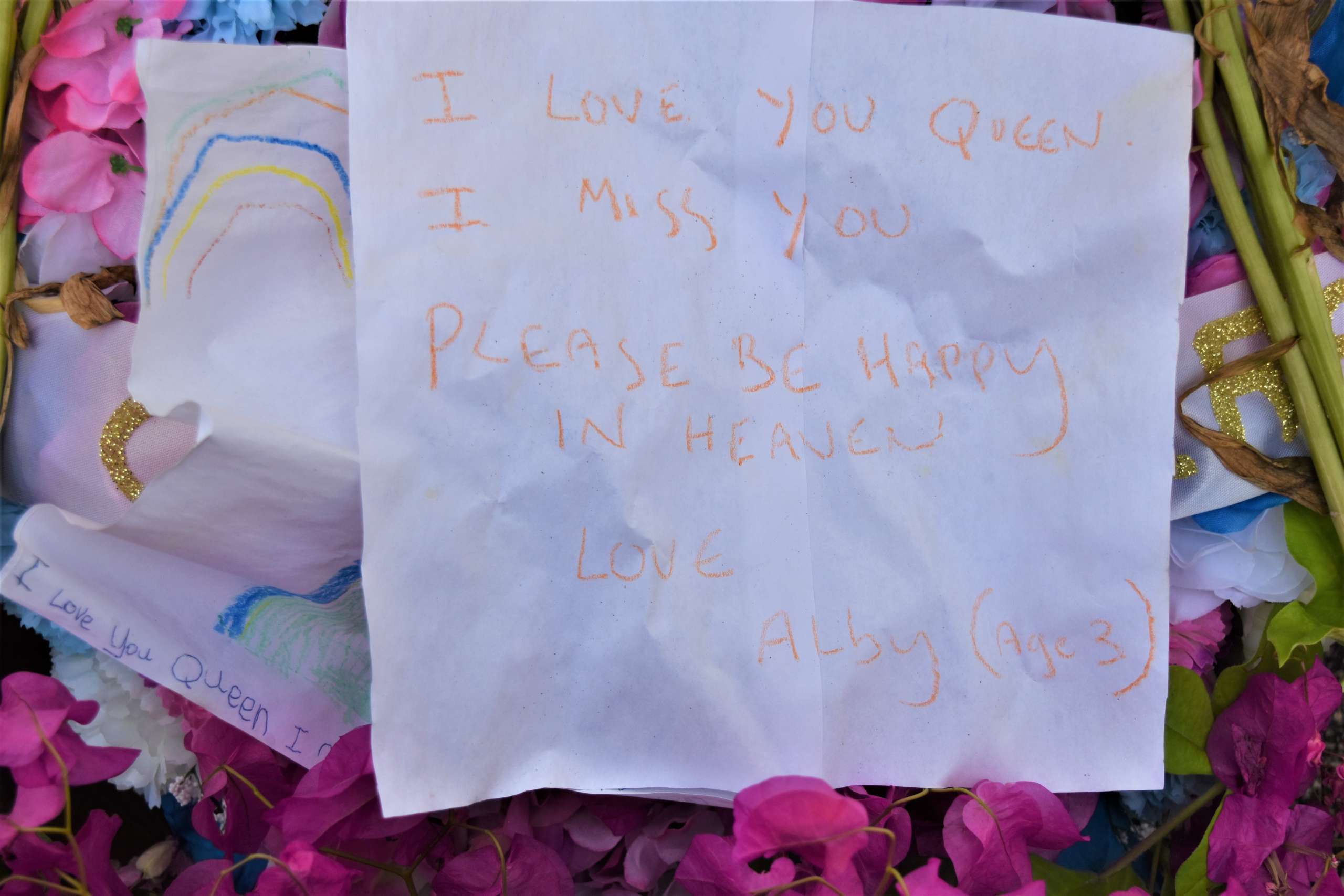 Queen note Cayman Compass