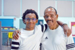 Fathers and sons bond over dominoes