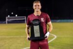 Rising football star leads on the pitch and in the classroom
