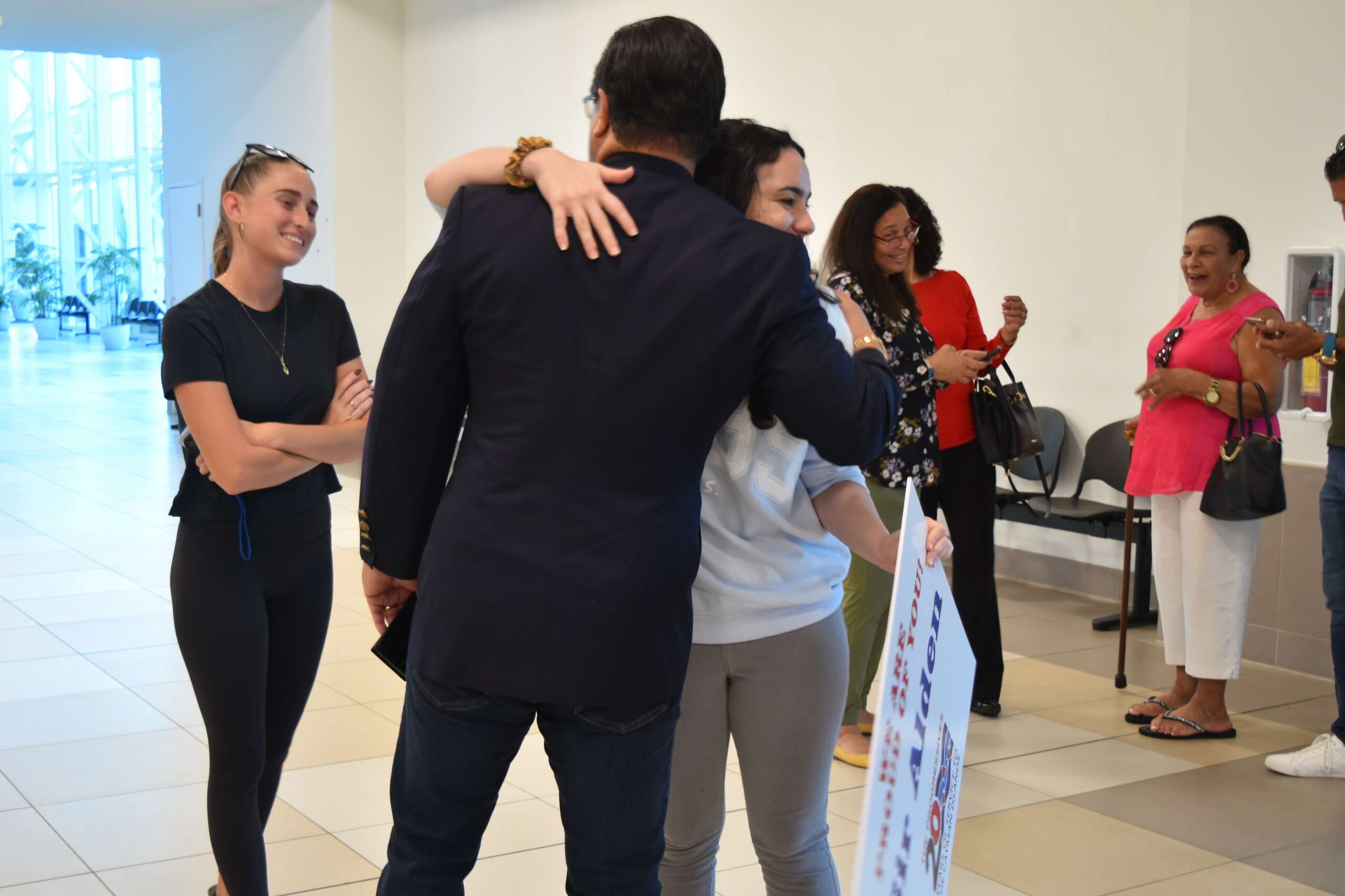 Cheers as McLaughlin returns after being knighted by King Cayman Compass