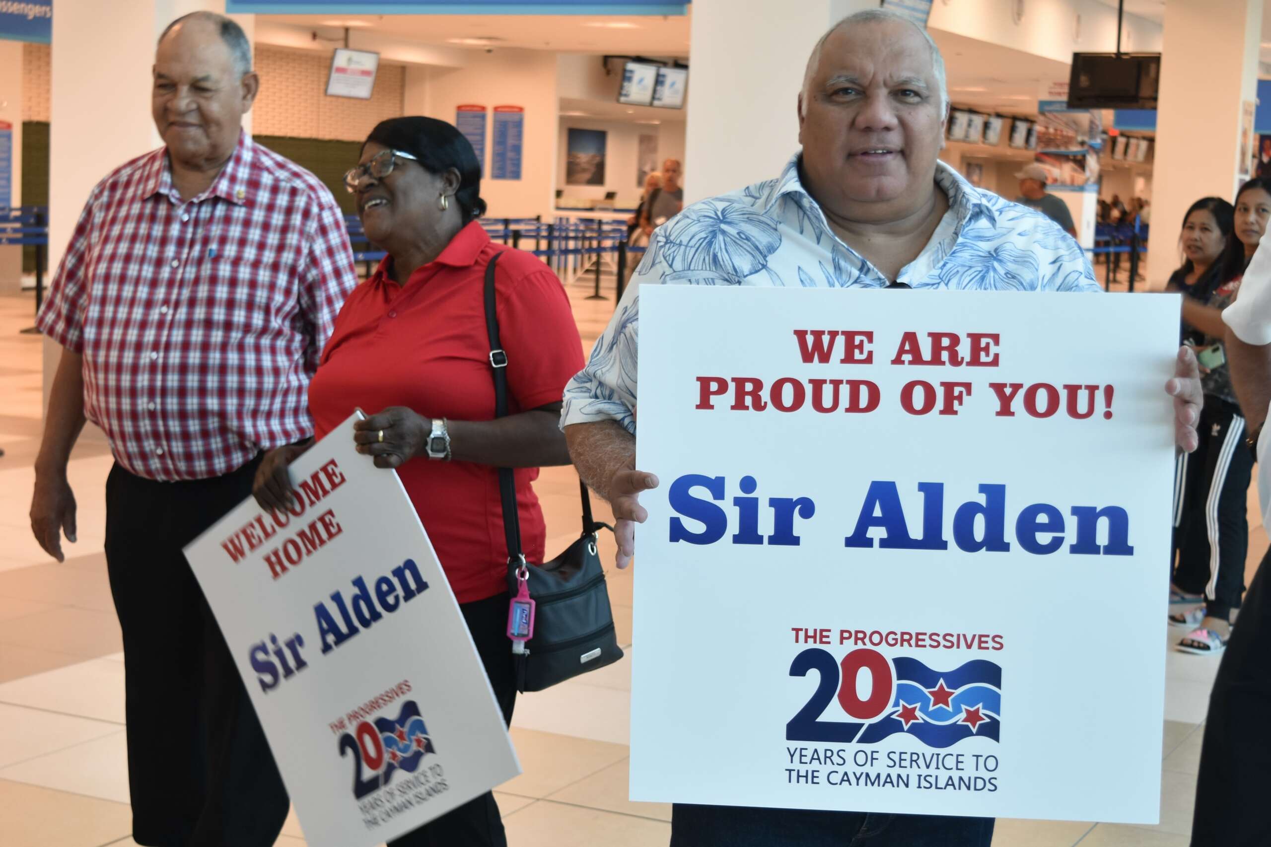 Cheers as McLaughlin returns after being knighted by King Cayman Compass