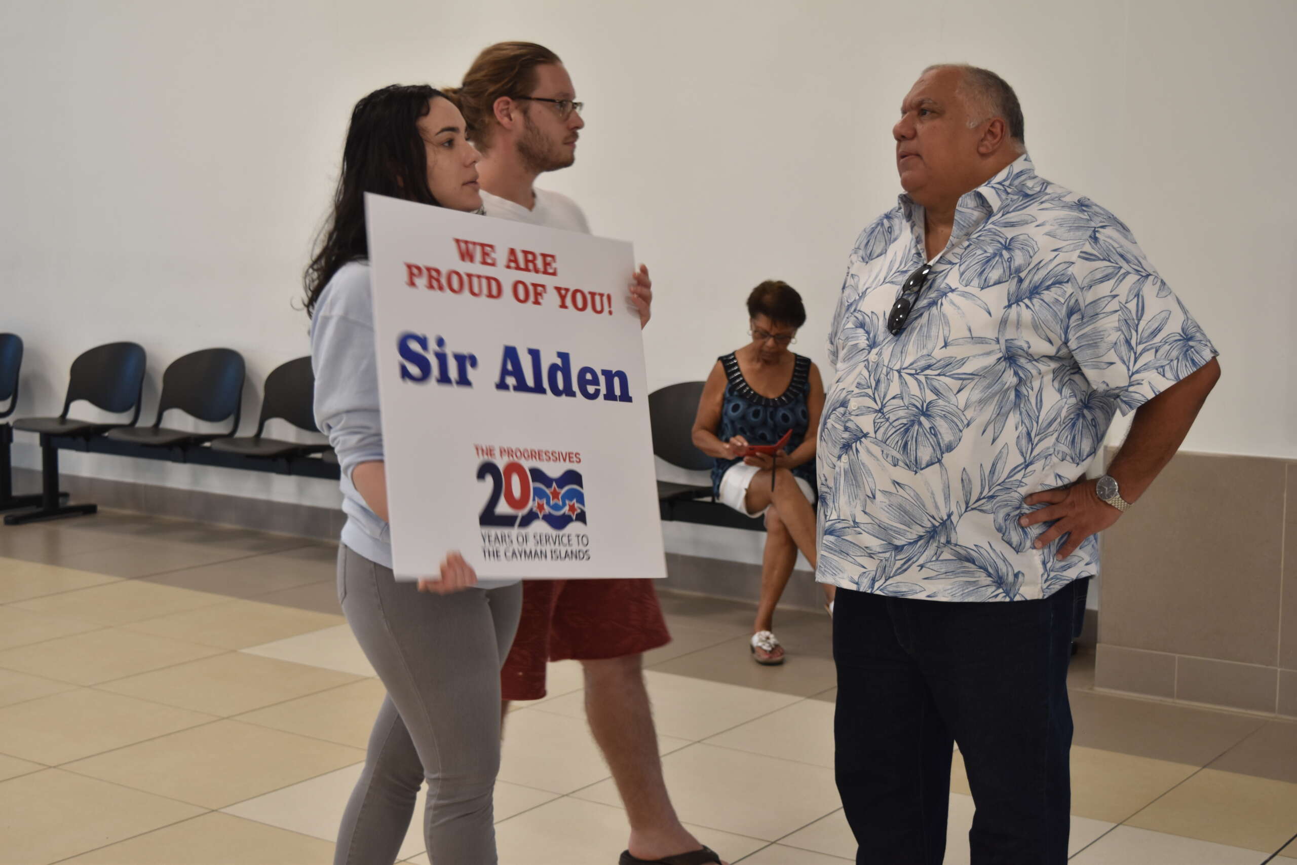 Cheers as McLaughlin returns after being knighted by King Cayman Compass