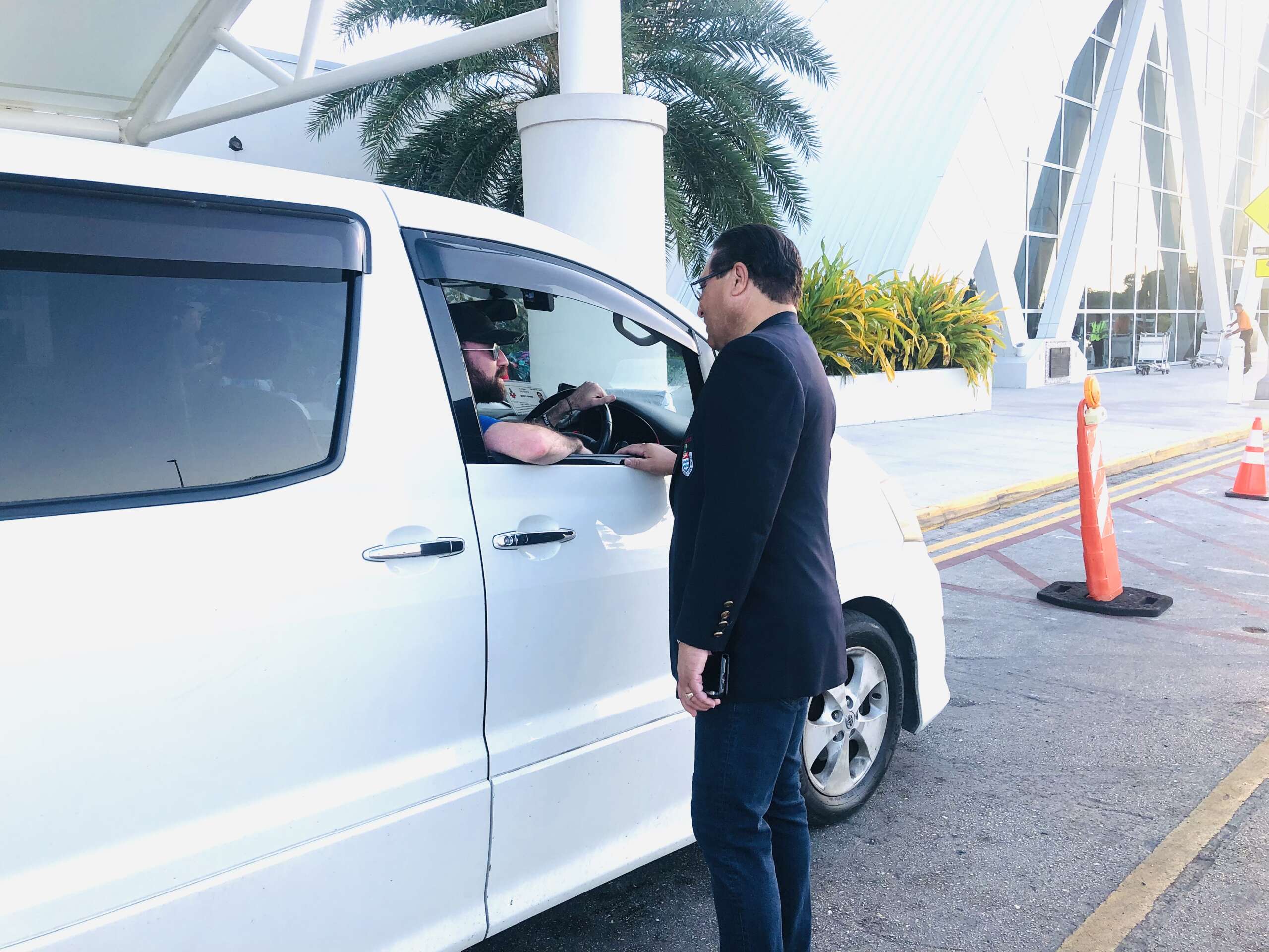 Cheers as McLaughlin returns after being knighted by King Cayman Compass