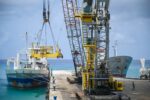 Cruise and cargo port debates revive development questions Cargo ships call to the port in George Town approximately 400 times a year. - Photo: Alvaro Serey