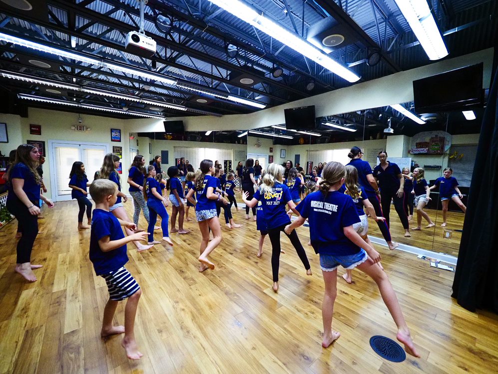 It's showtime for Oliver! JR. Cayman Compass