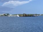 Salvage firm recovering sunken Cayman Mermaid boat