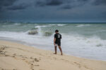 Rough seas generated by Hurricane Idalia lash Cayman coast