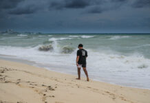 Rough seas generated by Hurricane Idalia lash Cayman coast