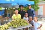 Kids learn responsibility one guinep at a time