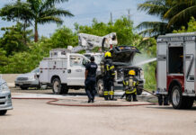 Firefighters douse truck fire at roundabout