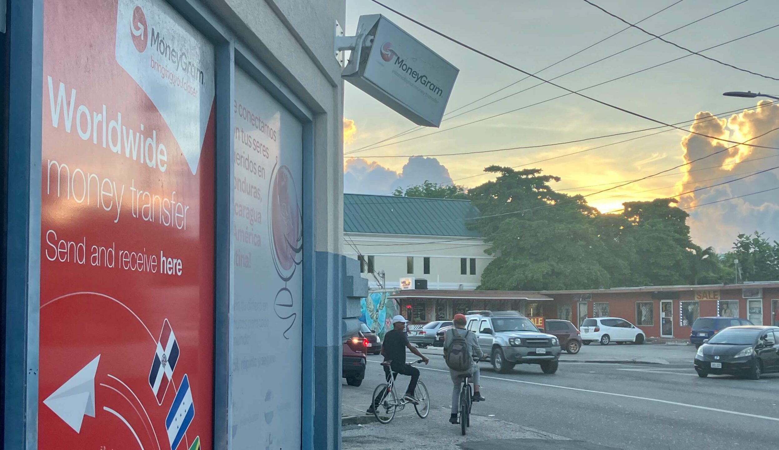 Moneygram in George Town is one of a handful of services that help send remittances overseas. Tourism jobs can support remittances. - Photo: James Whittaker