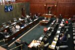 Premier Panton and PACT government survive despite narrow vote of no confidence