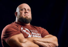 Cayman flexes muscles for Strongman event