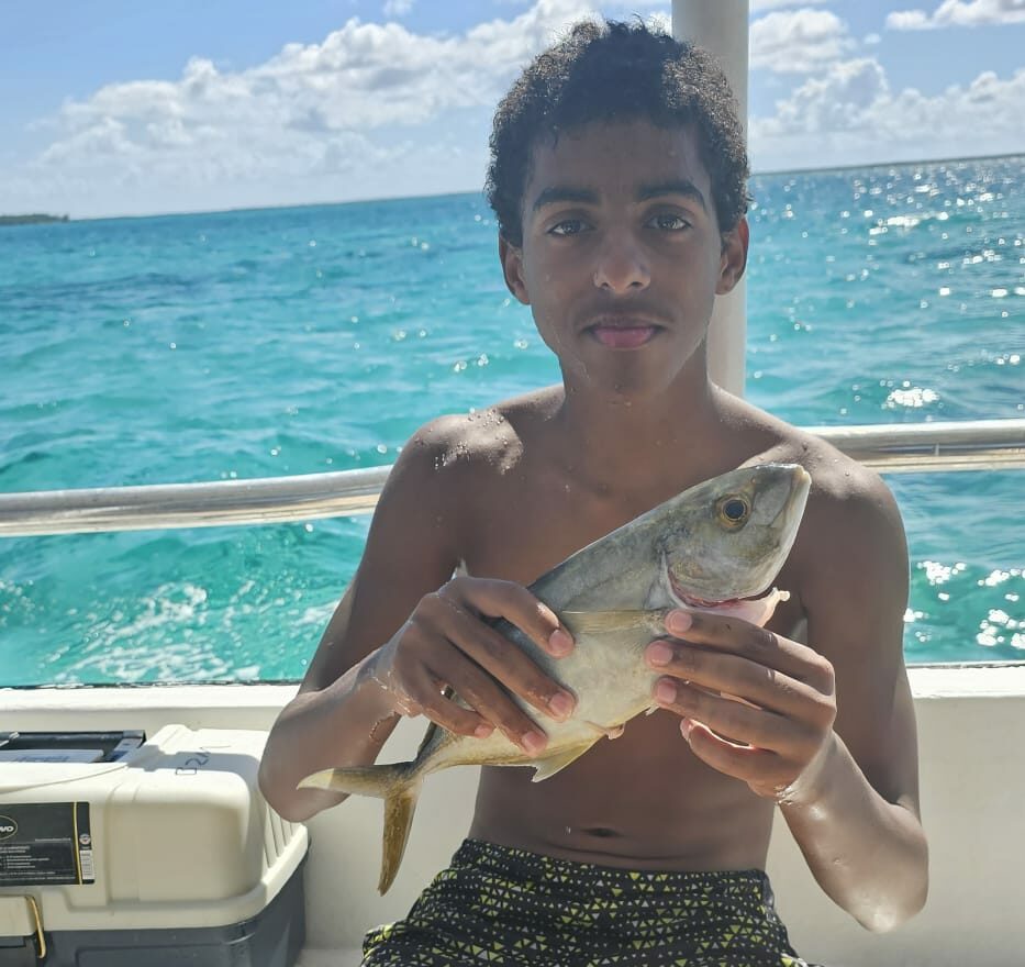 Boyz2Men trip introduces youth to fishing - Cayman Compass
