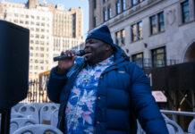 Local musician spreads ‘Caymankind’ on NYC’s double decker bus