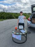 Cayman student sells ‘flamingo-ade’ to raise funds for National Trust