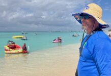 Special report: Vendors fight for their livelihoods as tourism visions clash on Seven Mile Public Beach