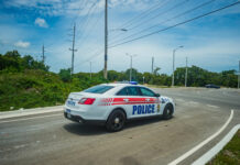 Man hits cop car in escape attempt, held on gun and drugs charges