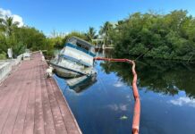 DoE monitoring sunken vessel in North Sound Estates