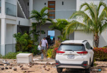Families evacuated as rough seas batter homes on Cayman’s western coast