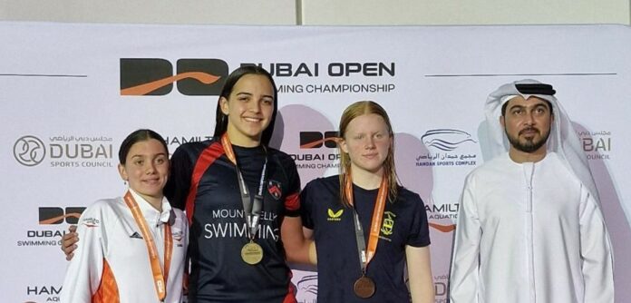 Sierrah Broadbelt swims to gold in Dubai Cayman Compass