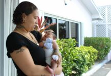 Two baby girls leap into unique birthdays