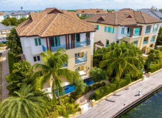 Take a look inside one of Cayman’s most exclusive mansions before it is sold at auction The $12m mansion in The Stone Island Residences is set to be auctioned today