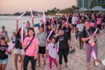 Hundreds Light up the Night for breast cancer awareness