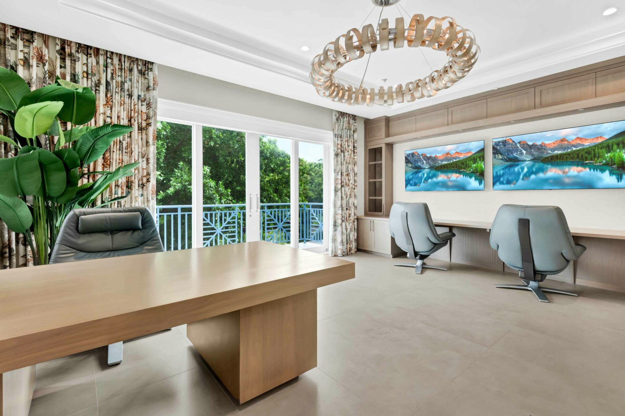 The home office has its own balcony and wall-mounted screens